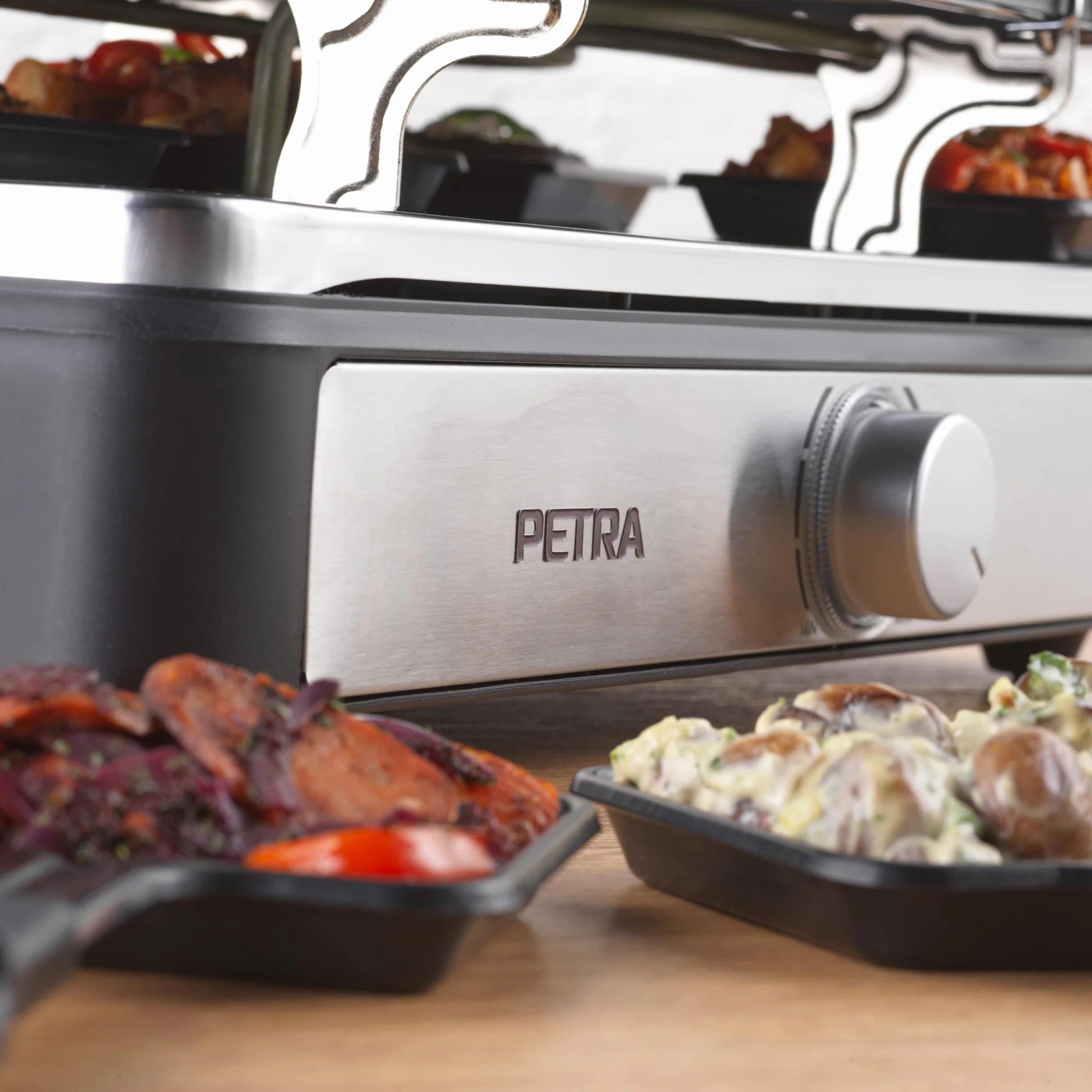 Petra PT4513VDE Elektryczny zestaw raclette i fondue 2 w 1, 1400 W, 1,3 l, 8 patelni