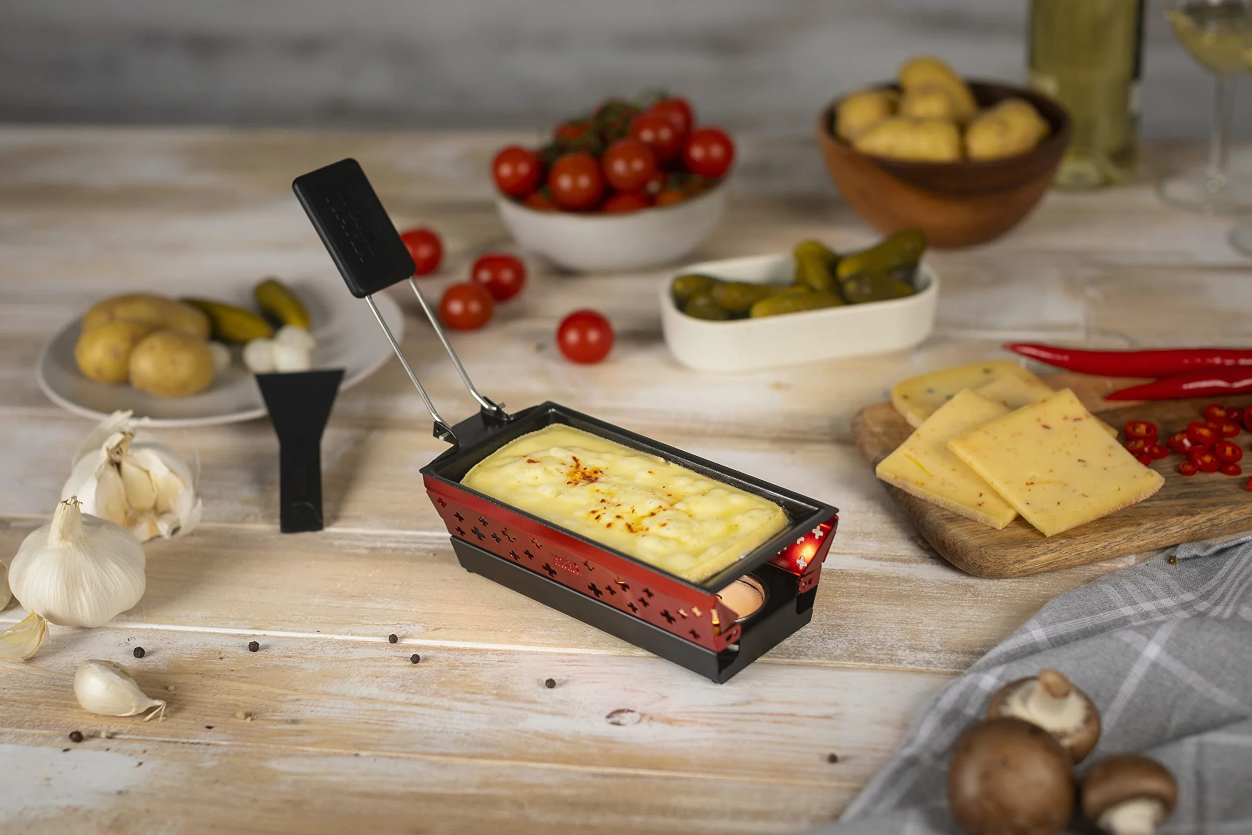 KUHN RIKON Candle Light Mini zestaw do raclette krzyż, czerwony, nieprzywierające patelnie do grilla