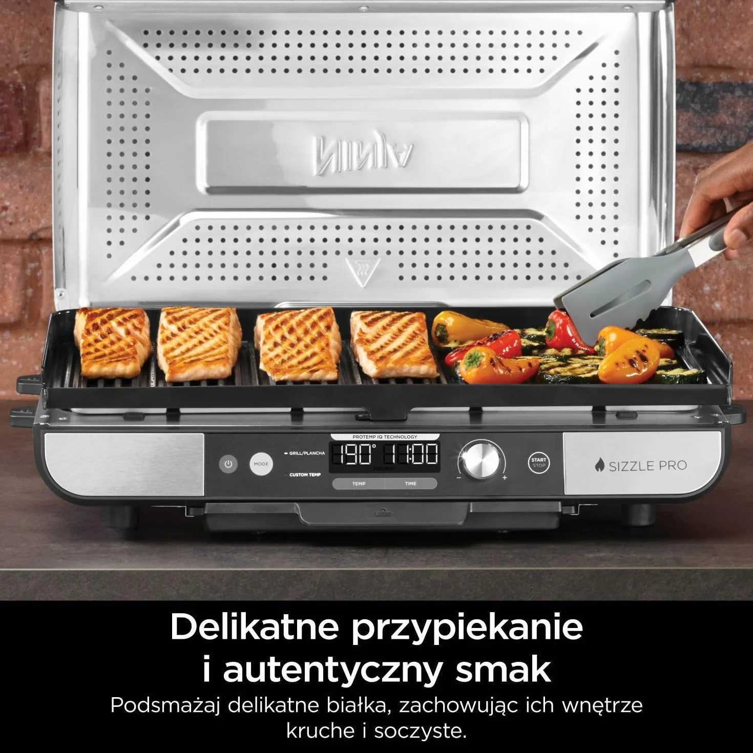 Ninja Sizzle Pro XL Grill z płytą płaską ma płytę grillową z nieprzywierającą powłoką ceramiczną i płaską płytę górną, zdejmowaną pokrywę, tackę na tłuszcz i książkę kucharską, srebrny/czarny GX101EU
