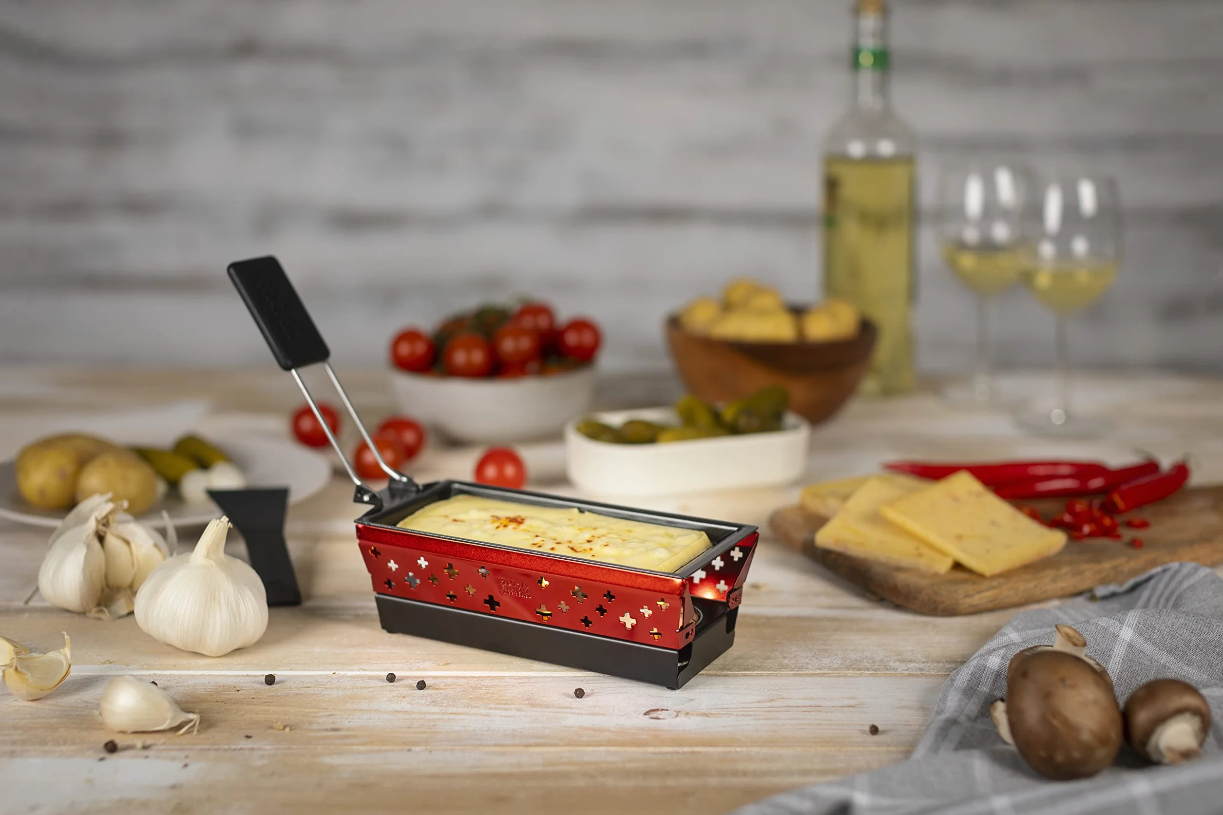 KUHN RIKON Candle Light Mini zestaw do raclette krzyż, czerwony, nieprzywierające patelnie do grilla