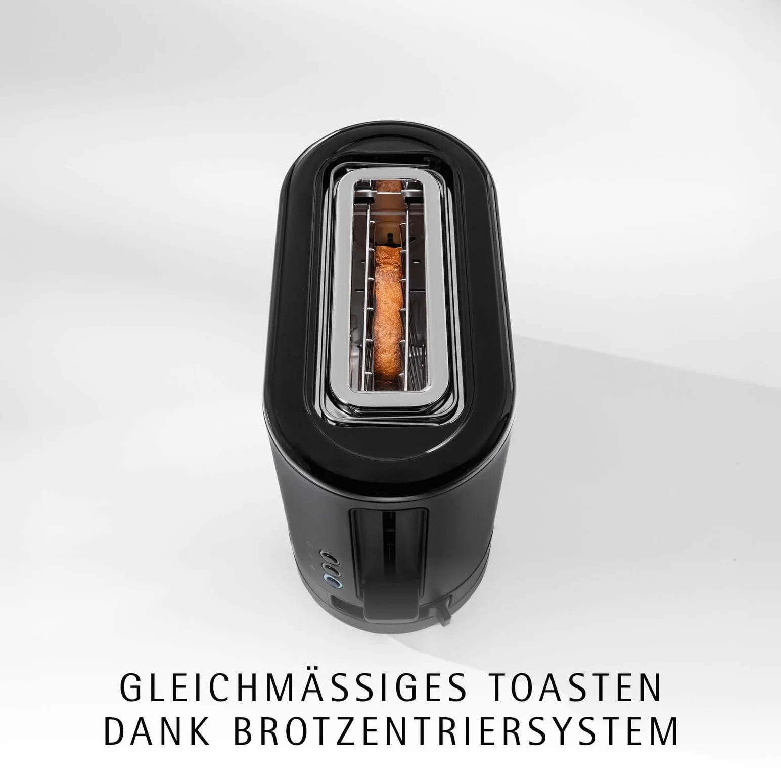 WMF Küchenminis toster 1 kromkowy z nasadką do bułek, na 1 szybę XXL, funkcja rozmrażania, toster z długim szczeliną z 7 poziomami opiekania, 600 W, stal nierdzewna, czarny matowy